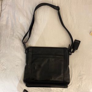 Tumi leather black crossbody bag